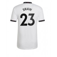 Dres Manchester United Luke Shaw #23 Gostujuci 2022-23 Kratak Rukav